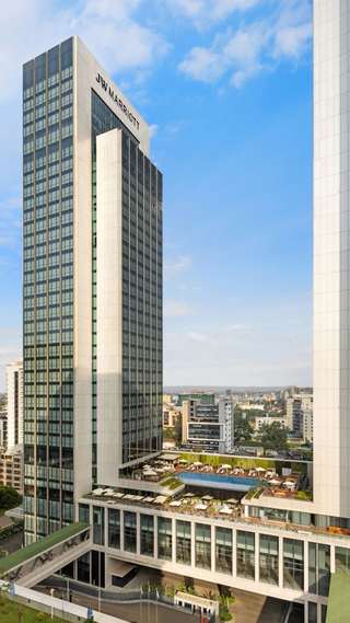 JW Marriott Nairobi hotel tower exterior with rooftop pool